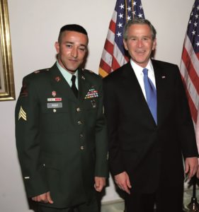 Wounded Army veteran Sergeant Wasim Khan and President George W. Bush